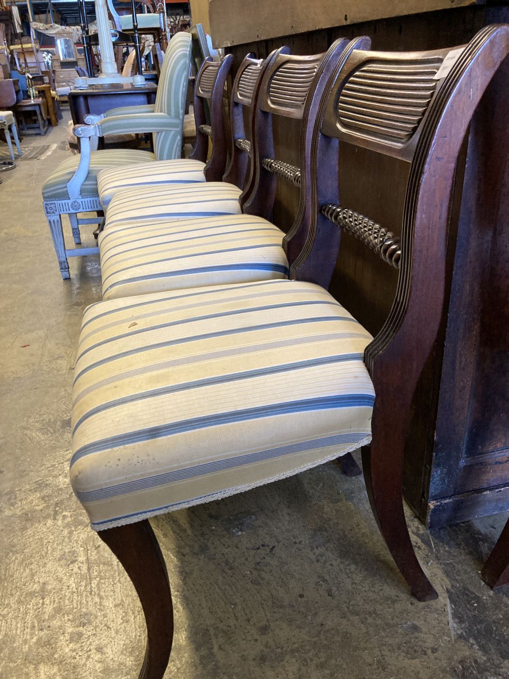 A set of four Regency mahogany dining chairs